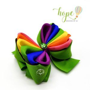 Beautiful Rainbow Hair Bow for Girls with a Unique Style. It Has a Rhinestone.